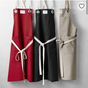2 Williams Sonoma Aprons. Choose red or grey